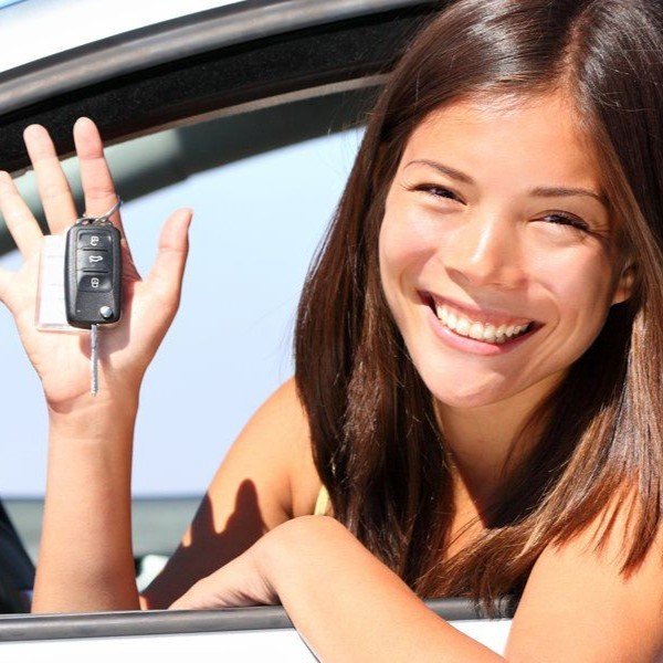 Woman Smiling with Car Keys